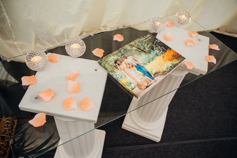 guest book displayed on glass table