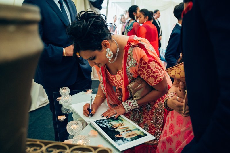 signing guest book