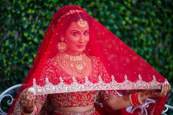 bride looking at camera under veil