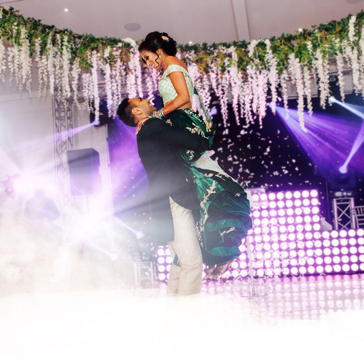 groom-picks-up-bride-during-first-dance