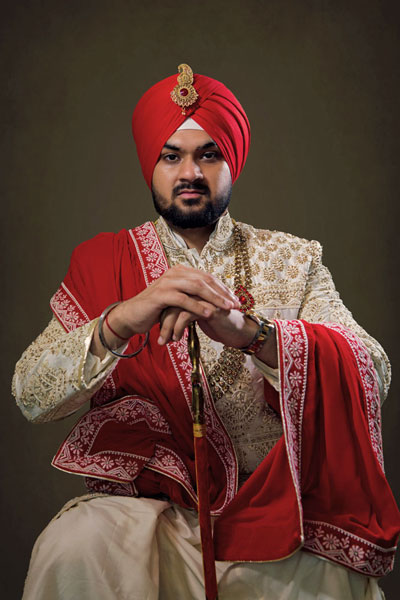 groom sikh sitting down photo 4