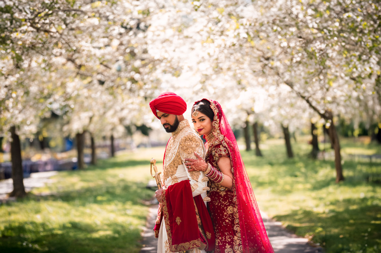 asian wedding photo with blossom trees